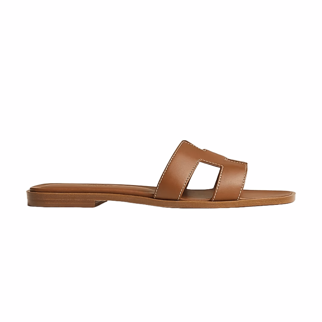 Iconic Hermès Oran flat sandal in gold leather with H-cut strap
